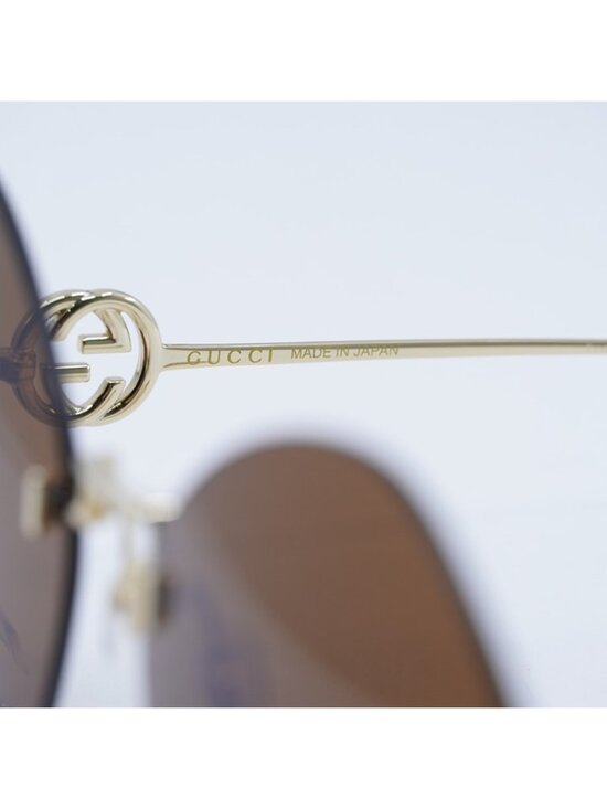 Gucci GG1203S 003 Sunglasses Gold Round Frame, Brown with Gold Chain Lenses main image 9